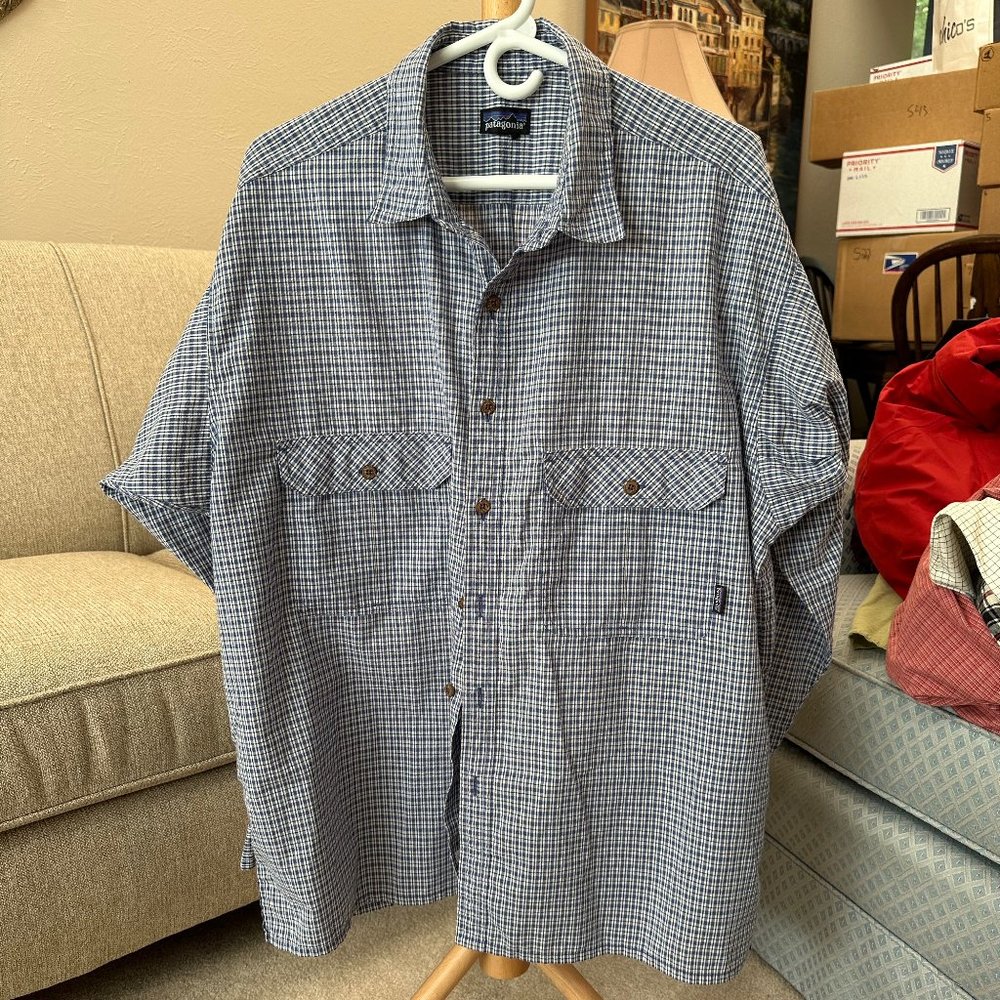 Patagonia Long Sleeve Button Down Shirt.  Probably XL and 100% Cotton.